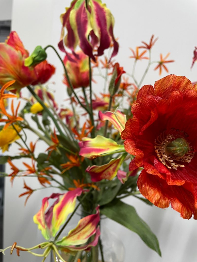 Oranje/geel kunstbloemen boeket