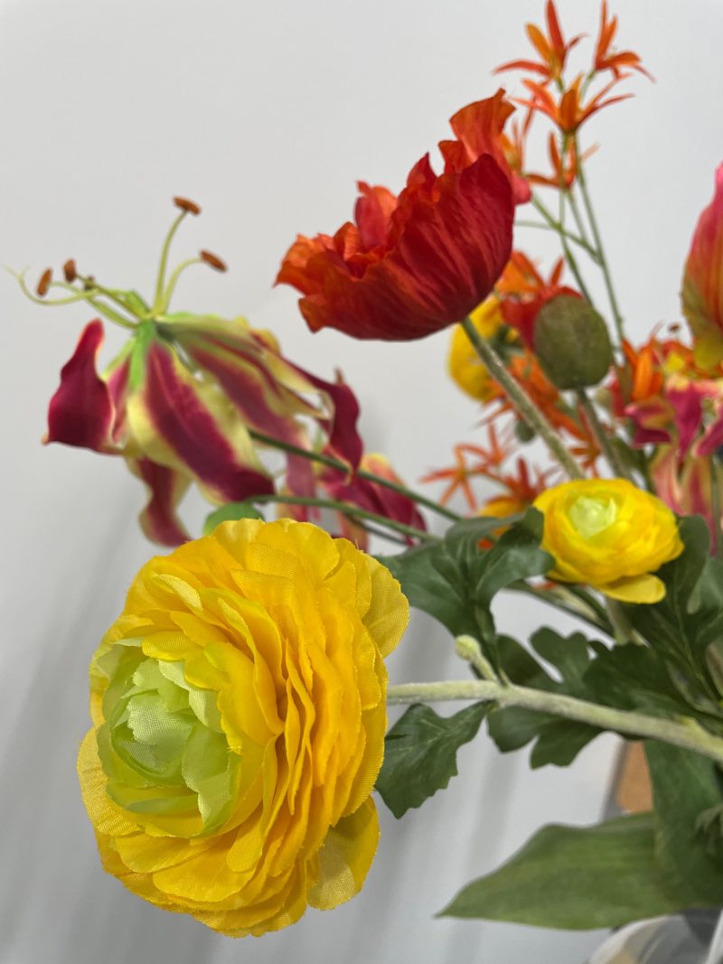 Oranje/geel kunstbloemen boeket